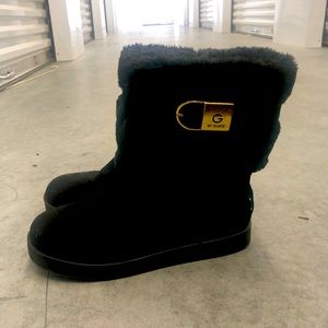 Like new Guess short black suede boots with faux fur trim.